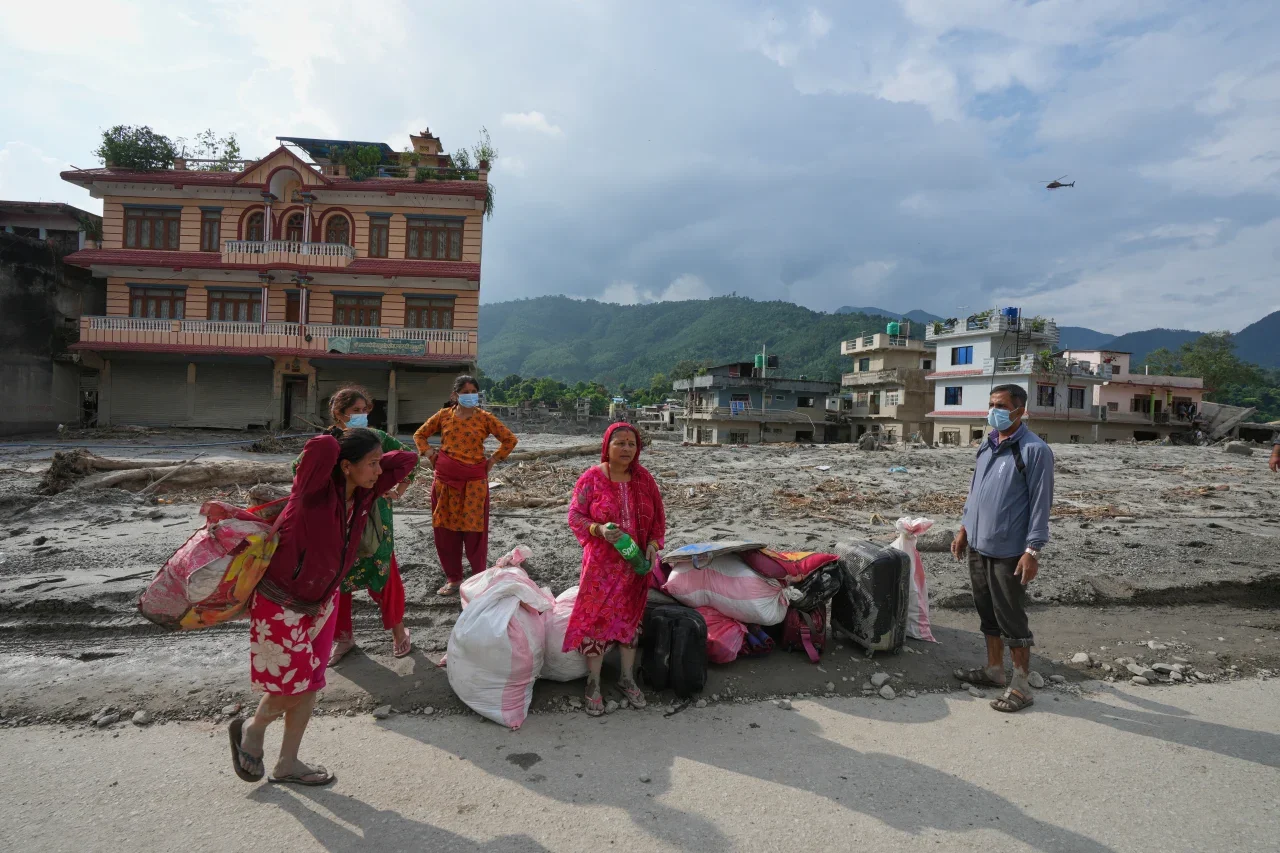 Nepal flash flood — submerged homes and rising water