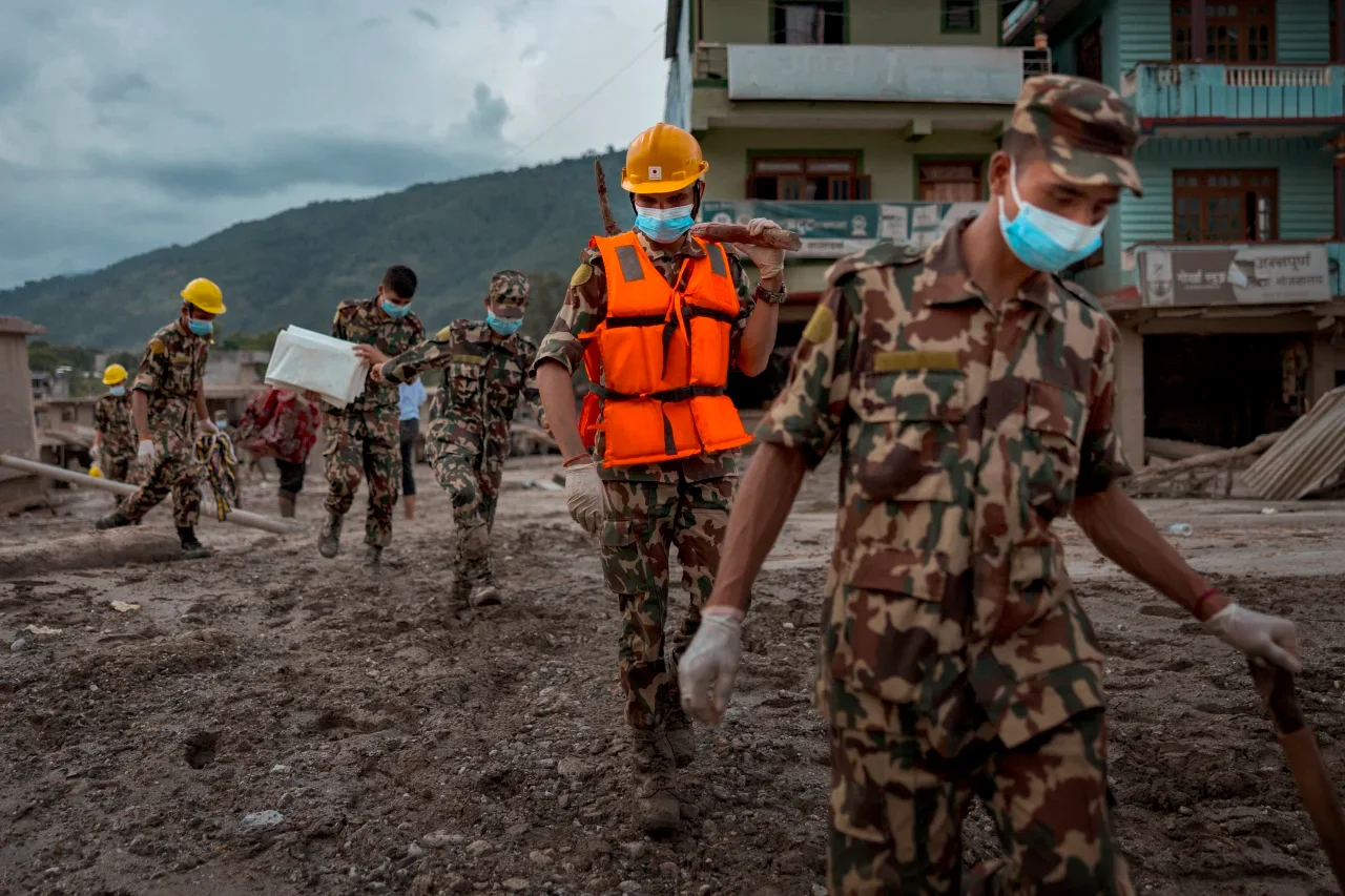 Nepal flash flood — rescue teams helping affected families